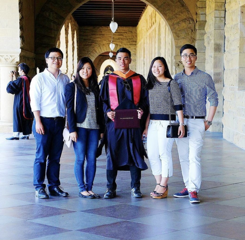 Robin (in the middle) and friends at graduation ceremony at Stanford University back in 2017.